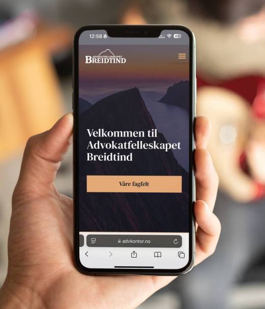 mockup-of-an-iphone-xs-with-a-guy-playing-guitar-in-the-back-25752-2